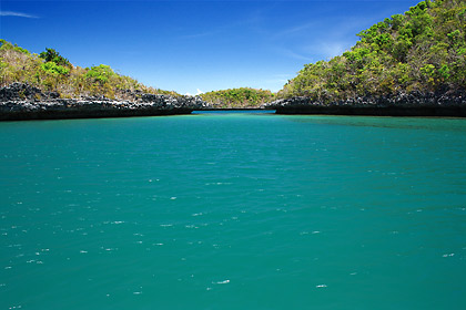 a group of islets amidst emerald waters on the way to Children's Island, Hundred Islands National Park
