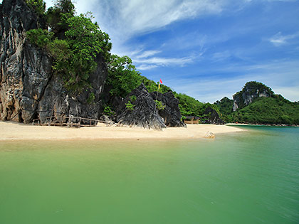 karst formations and sandy beach on Borawan, Lipata Island, Padre Burgos