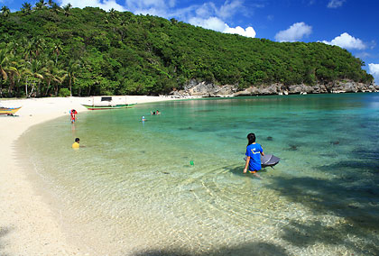 Puting Buhangin’s white sand and crystal-clear emerald waters
