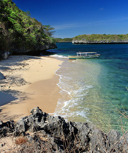 view of the beach on Marcos Island from the trail leading to Imelda Cave, Hundred Islands National Park